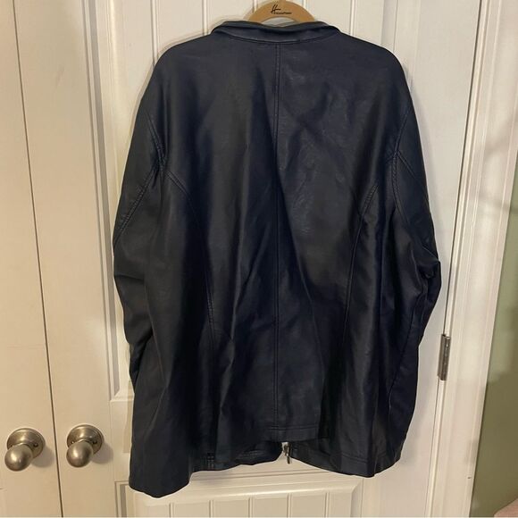 Navy blue, purple is some light. flawed item. Please see picture of spot on neck - Picture 3 of 7